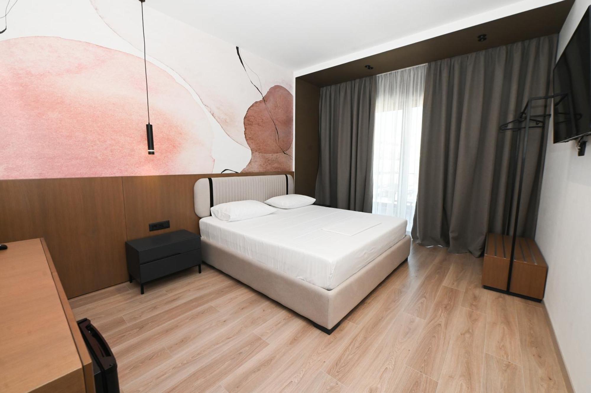 Monun Hotel Ксамил Экстерьер фото
