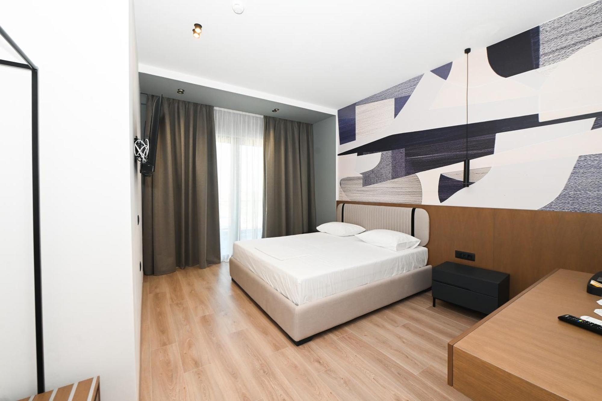 Monun Hotel Ксамил Экстерьер фото