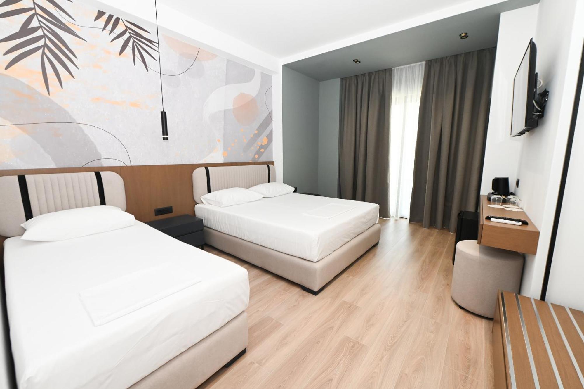 Monun Hotel Ксамил Экстерьер фото