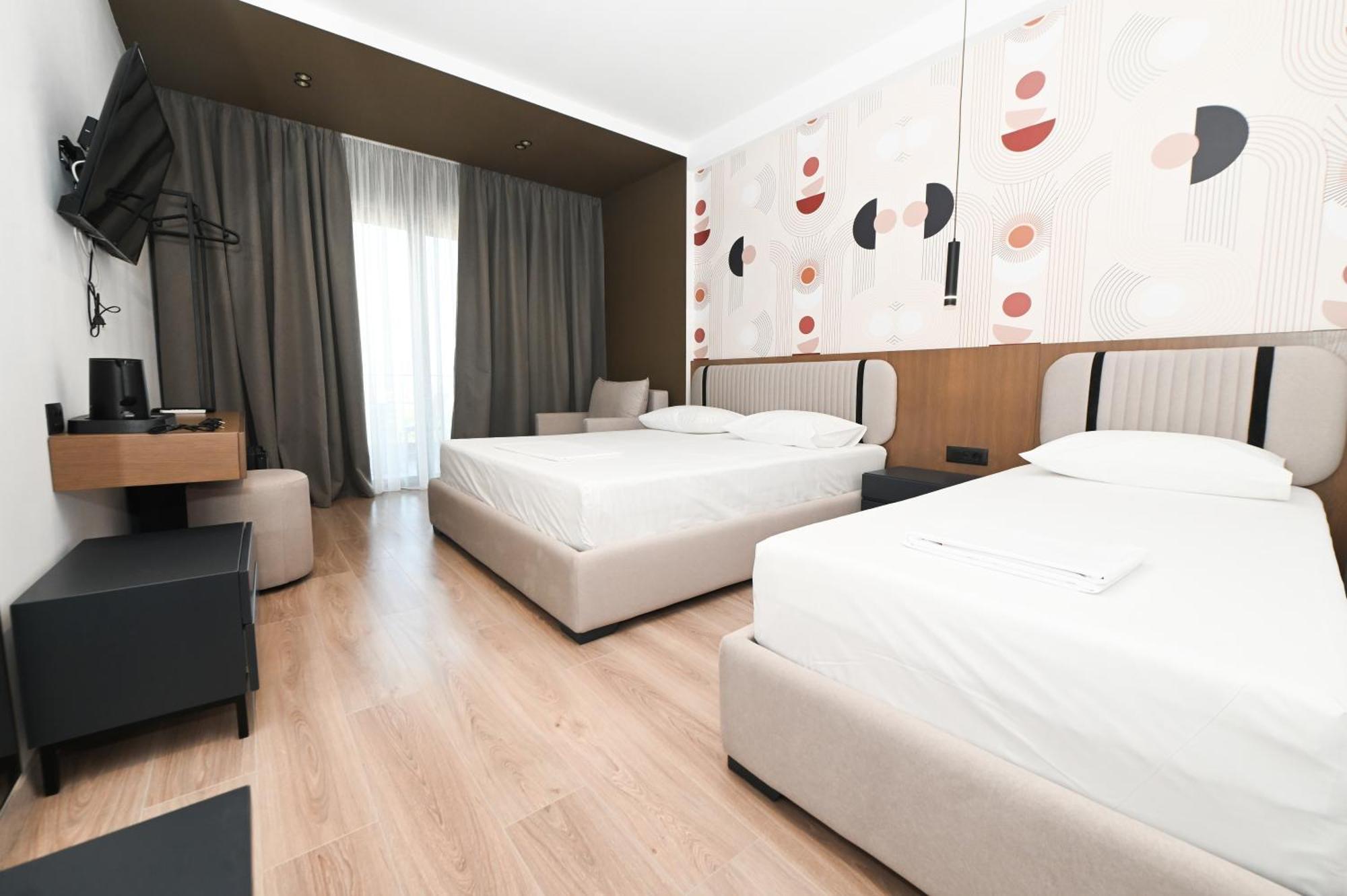 Monun Hotel Ксамил Экстерьер фото