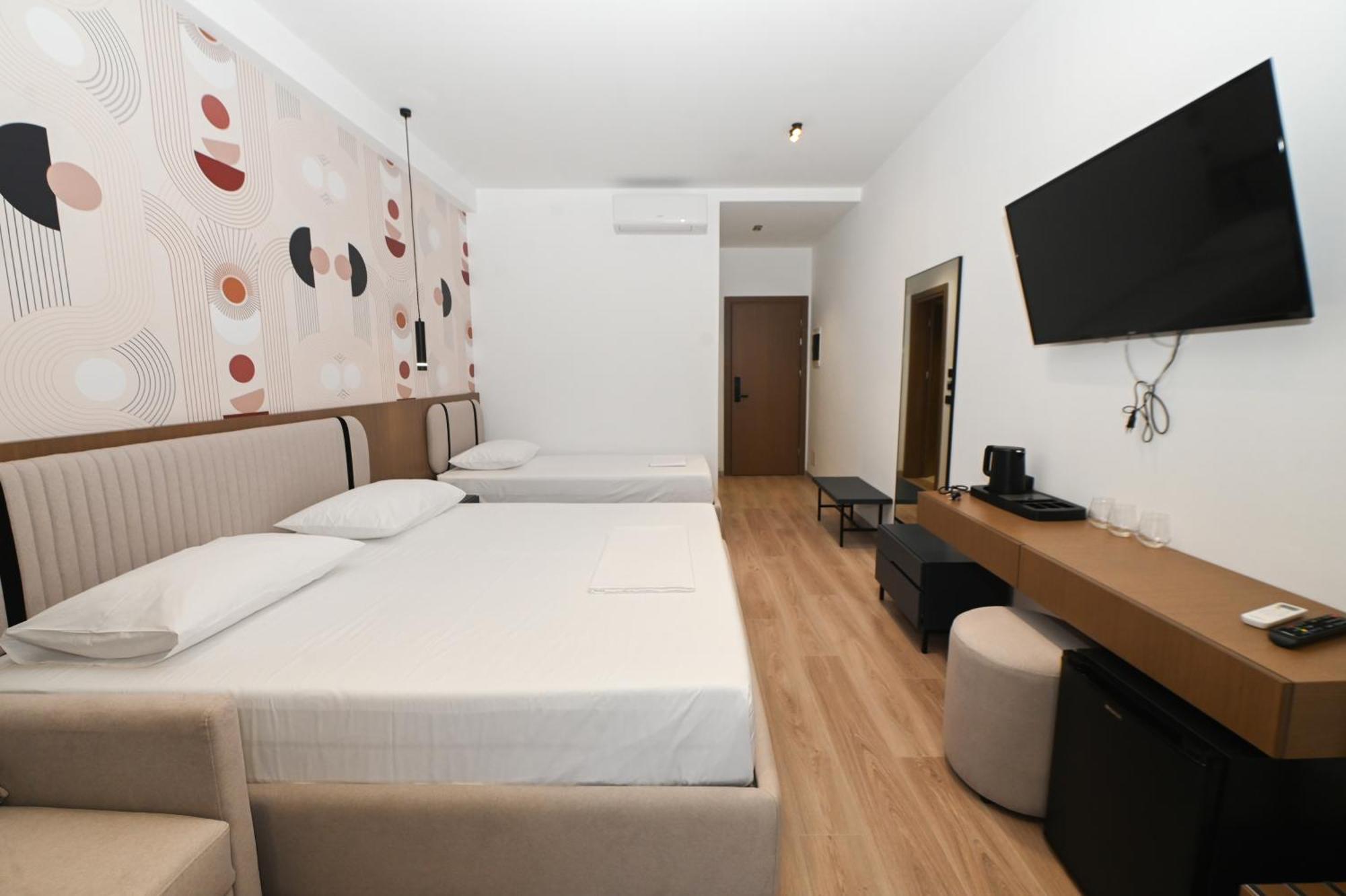 Monun Hotel Ксамил Экстерьер фото