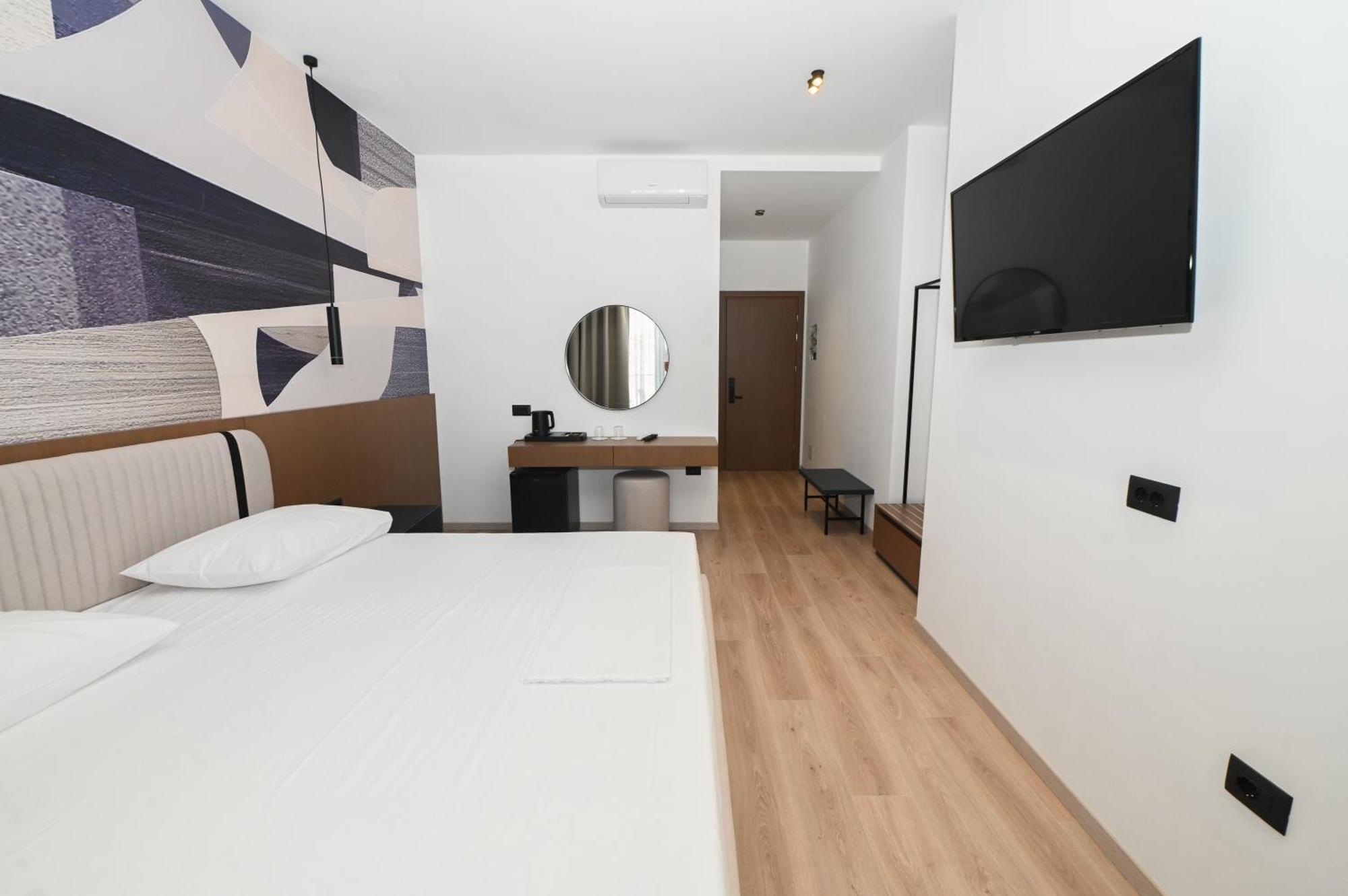 Monun Hotel Ксамил Экстерьер фото