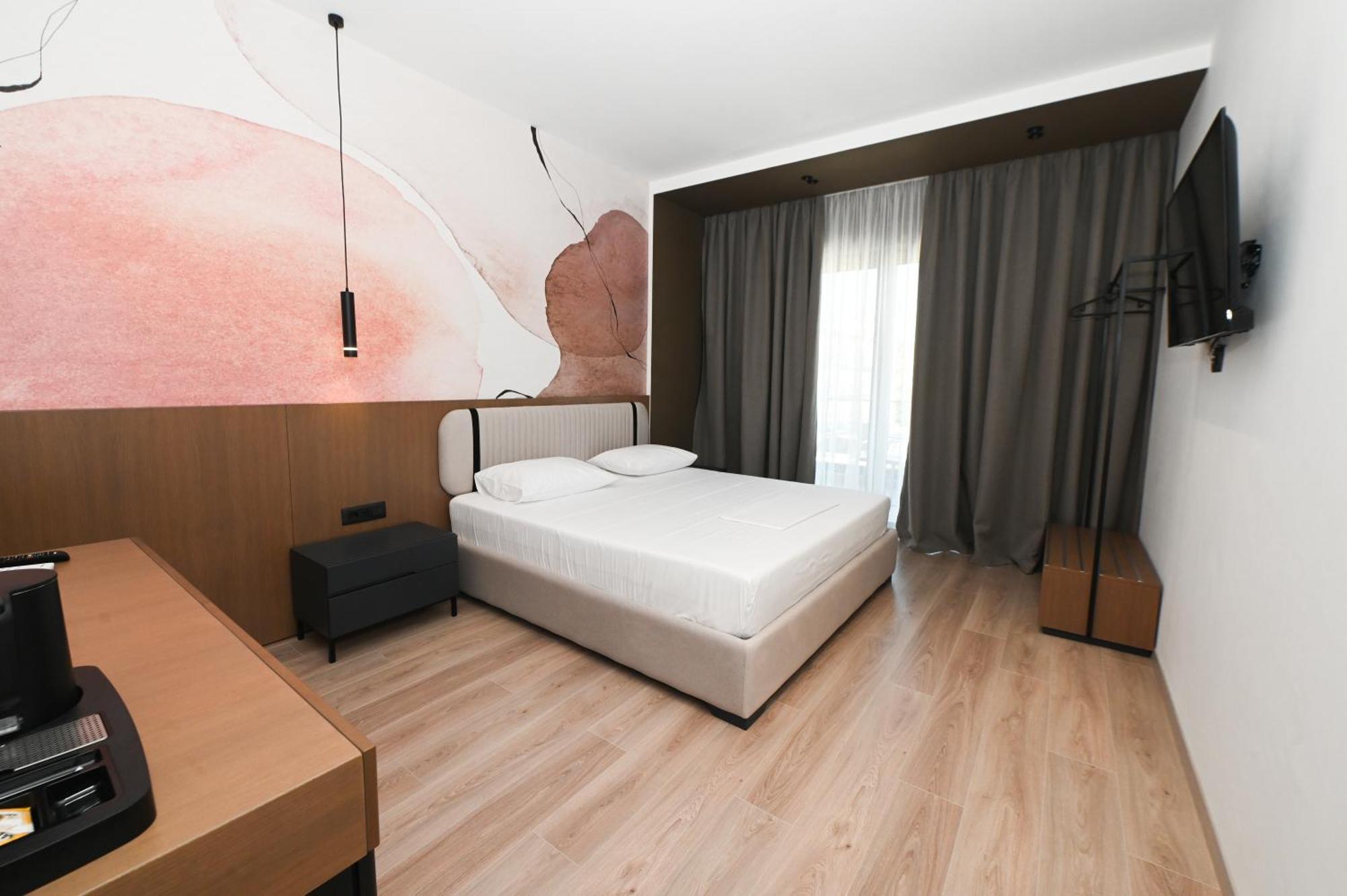 Monun Hotel Ксамил Экстерьер фото