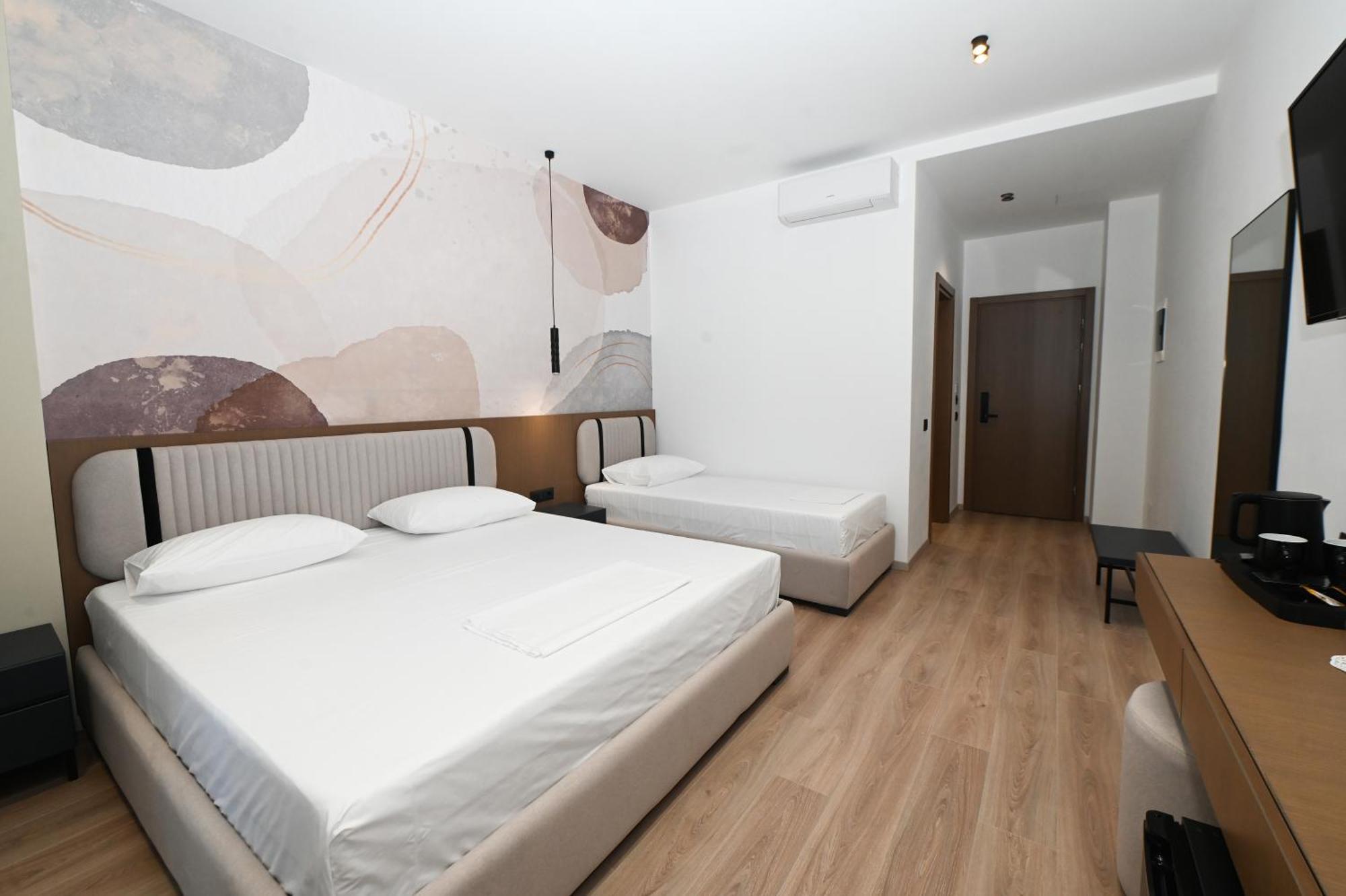 Monun Hotel Ксамил Экстерьер фото