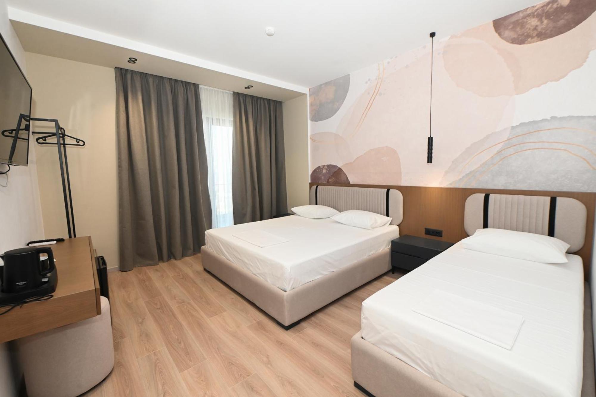 Monun Hotel Ксамил Экстерьер фото